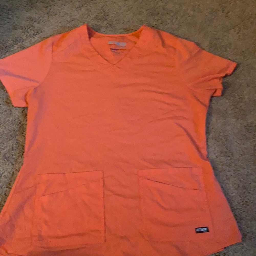Greys Anatomy scrub top. Size medium, color coral